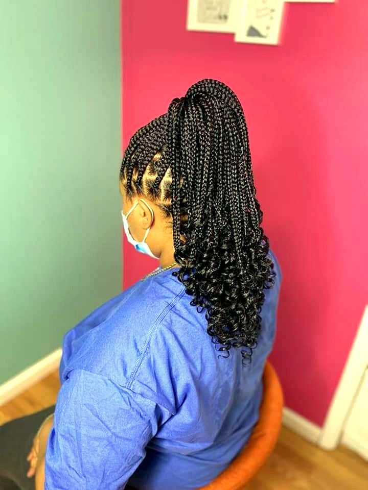 Braided ponytail with curly ends