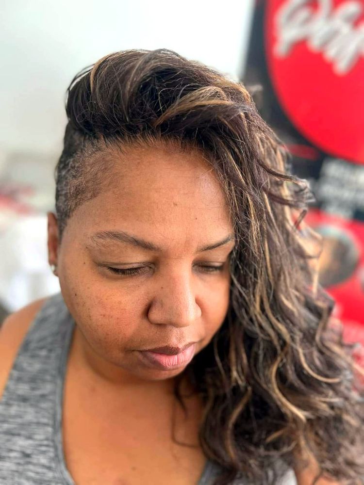 Sew-in with soft waves and highlights