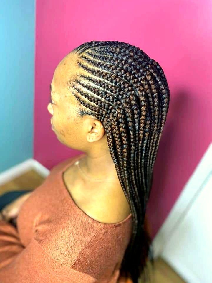 Side-swept cornrows in brown and black