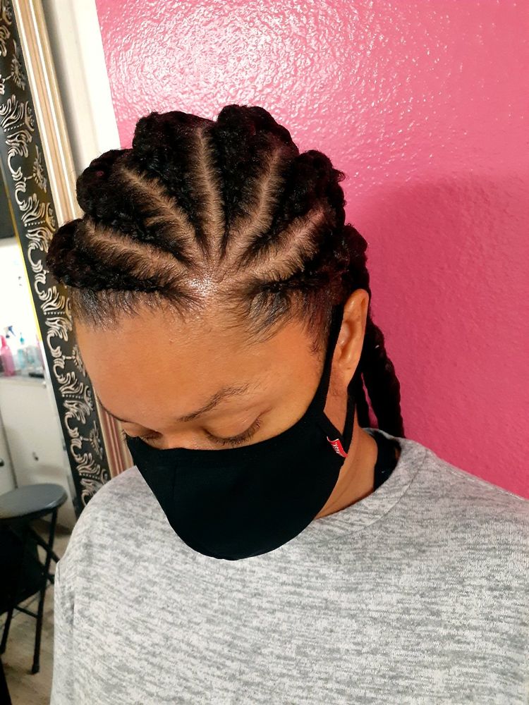 Cornrows with a medium part